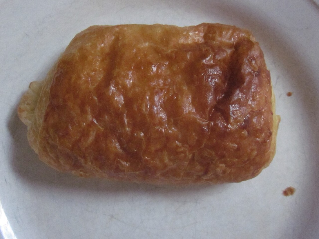 A freshly baked chocolate croissant