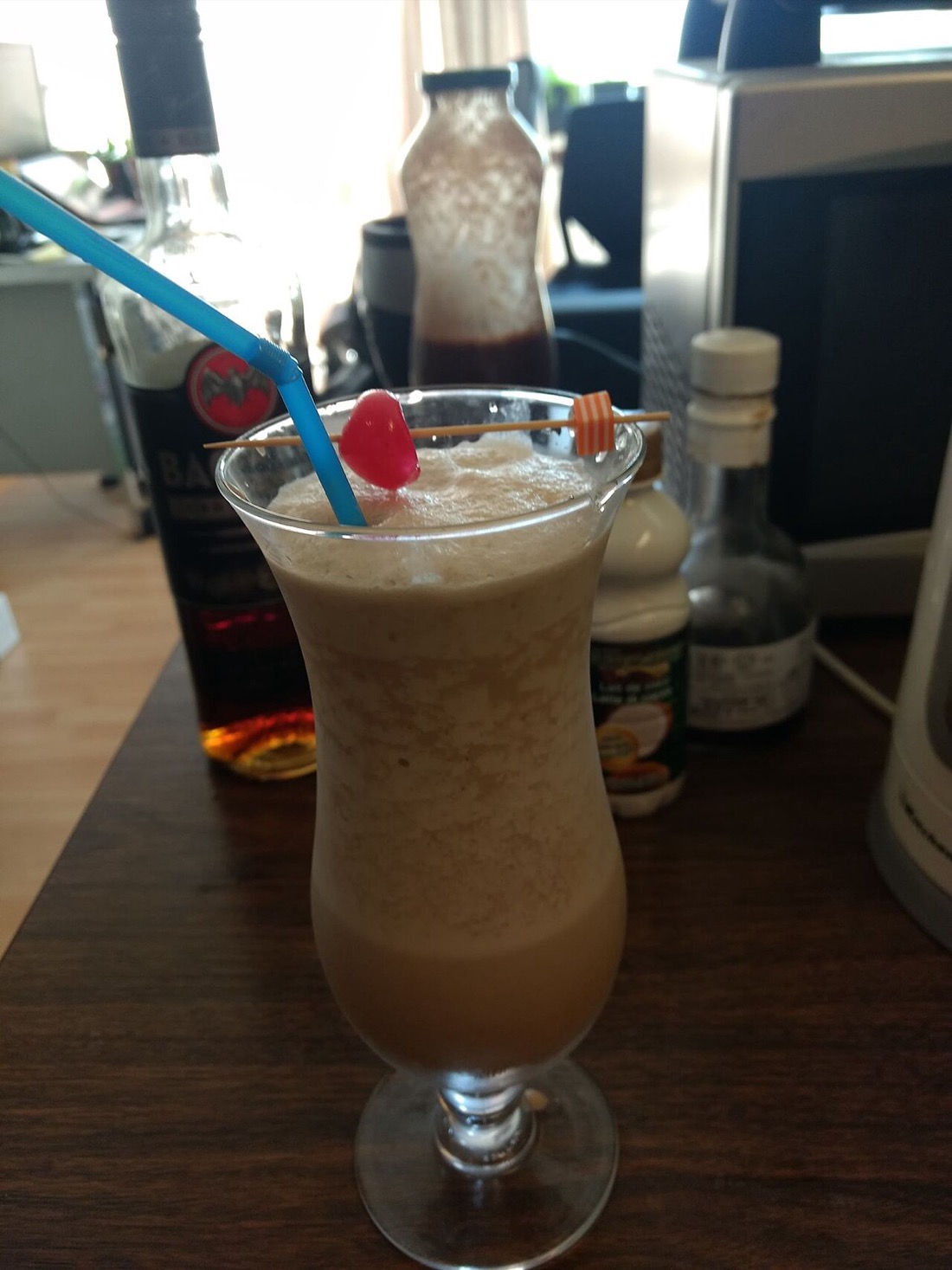 A cocktail served in a glass