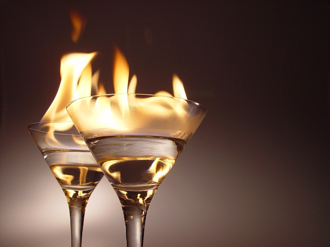 Cocktails being prepared at a bar