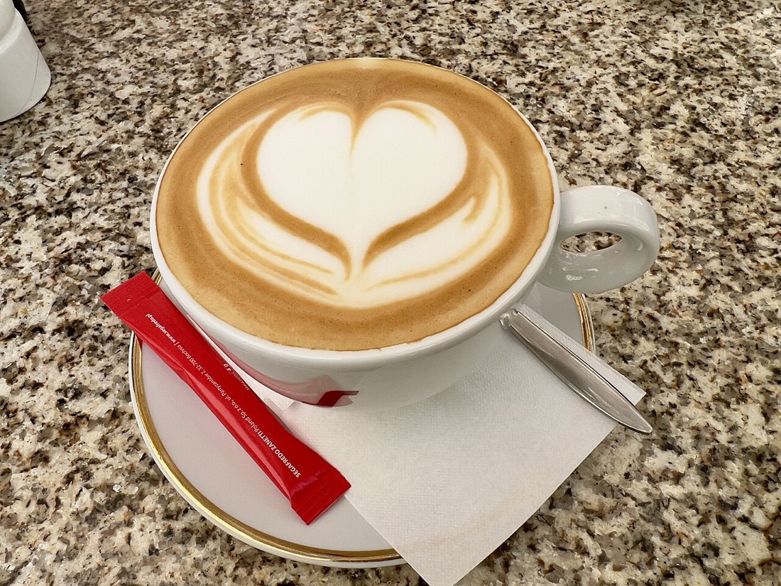 Heart-shaped latte art in a coffee cup