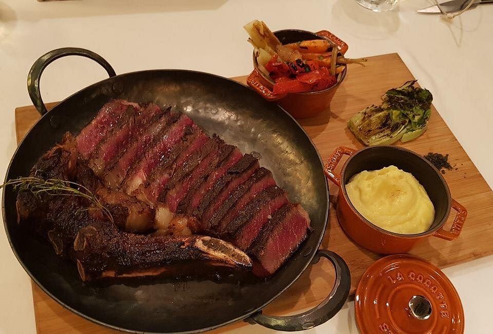 Charcoal-grilled ribeye at Thaan